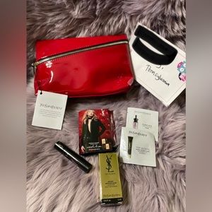 Red YSL cosmetics zip bag